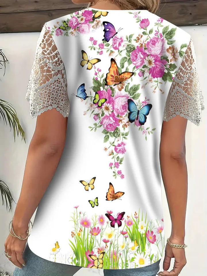 Erika | Elegantní top s krajkovým zakončením a květinovým vzorem motýla